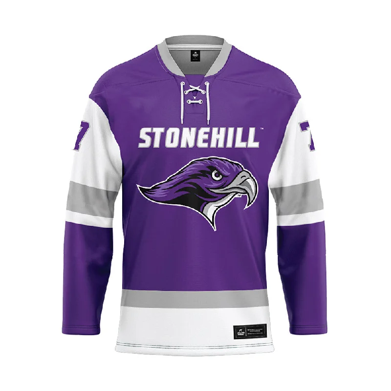 Stonehill - NCAA Women's Ice Hockey : Reagan Whynot - Purple Hockey Jersey Cream Jersey Tee Stonehill - NCAA Women's Ice Hockey : Reagan Whynot - Purple Hockey Jersey Cream Jersey Tee