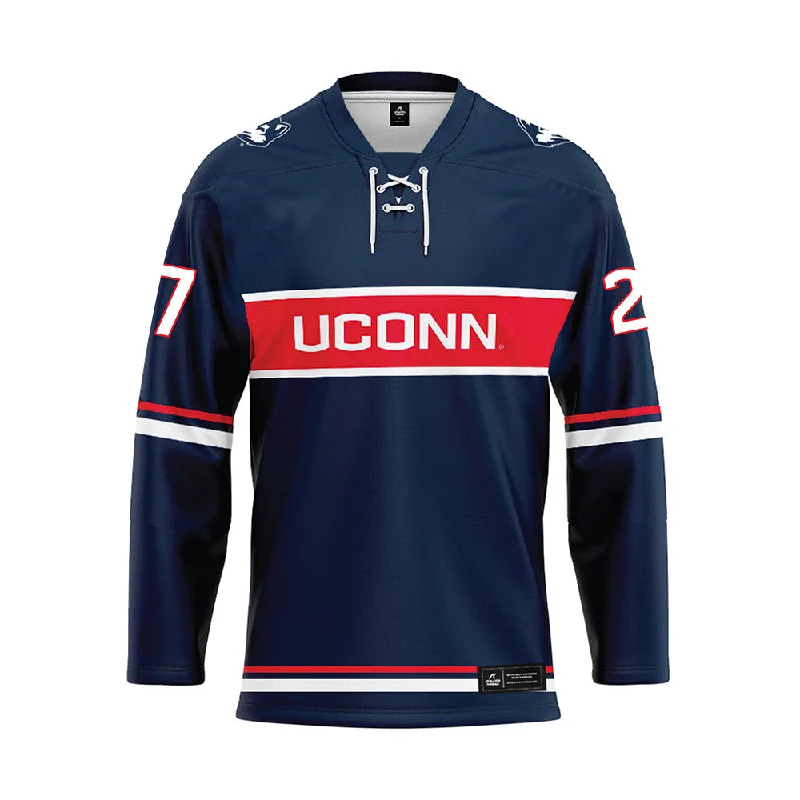 UConn - NCAA Women's Ice Hockey : Taylor Porthan - Navy Hockey Jersey Bronze Jersey Tee UConn - NCAA Women's Ice Hockey : Taylor Porthan - Navy Hockey Jersey Bronze Jersey Tee